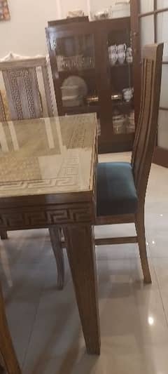 wooden dining with 4 chairs 0