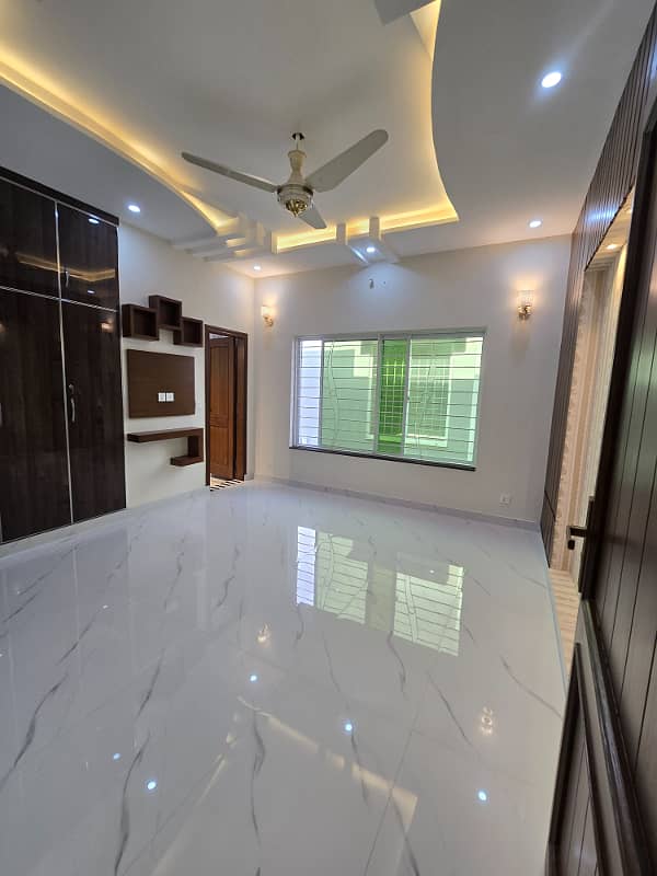 10 marla brand new modern house available for rent in sector F Talha block bahria town lahore 2