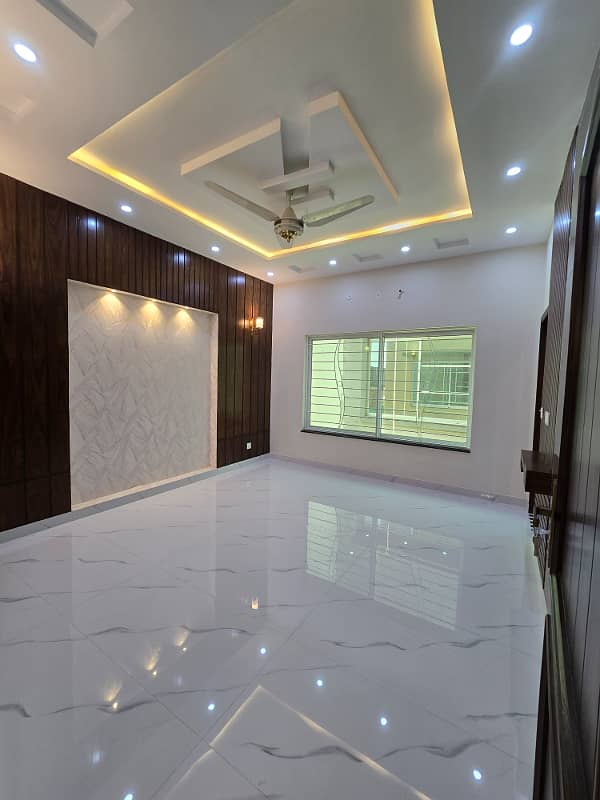 10 marla brand new modern house available for rent in sector F Talha block bahria town lahore 3