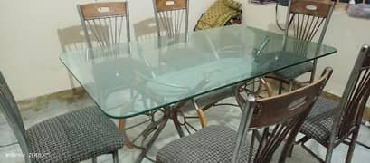 Dining table with 6 solid chairs. . . . . 0