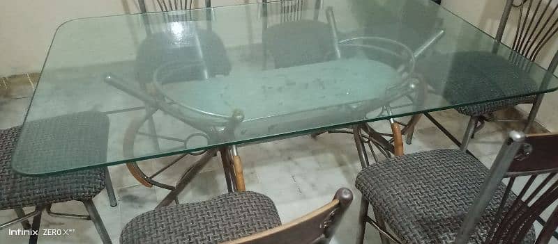 Dining table with 6 solid chairs. . . . . 1