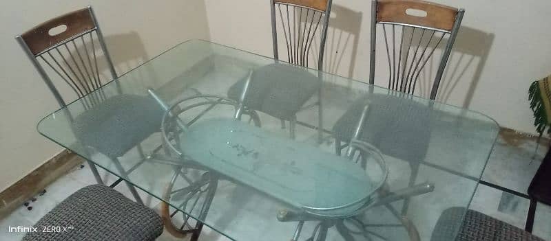 Dining table with 6 solid chairs. . . . . 3