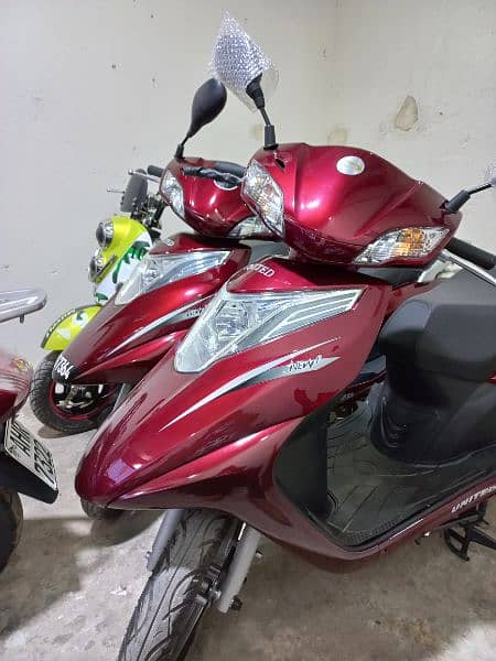 united scooty available contact at**03004142432** 4
