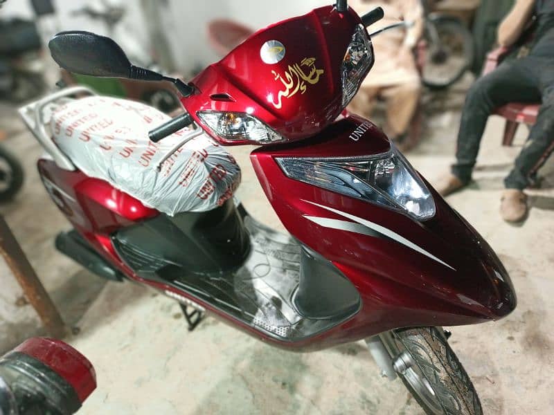united scooty available contact at**03004142432** 10
