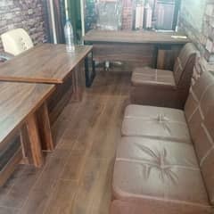 Three Tables with chairs and sofa set. one table larg with onter.