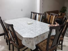 8 seater, double glass dinning table