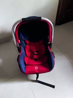 Almost brand new branded carry cot