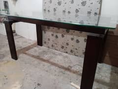 Wooden dining table new condition with 12mm glass