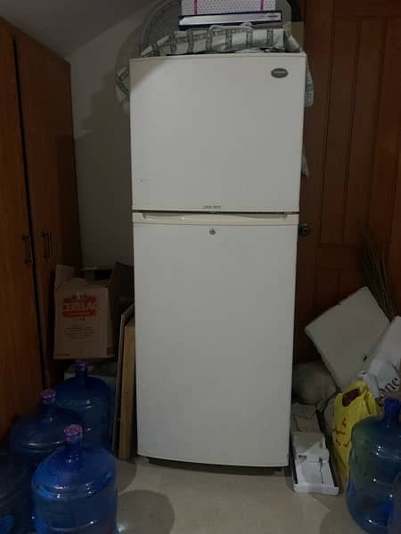 fridge is old but in working condition, large size 0