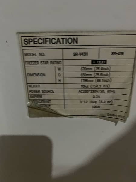 fridge is old but in working condition, large size 4