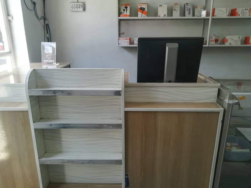 Running business of Mobile & stationery shop 4