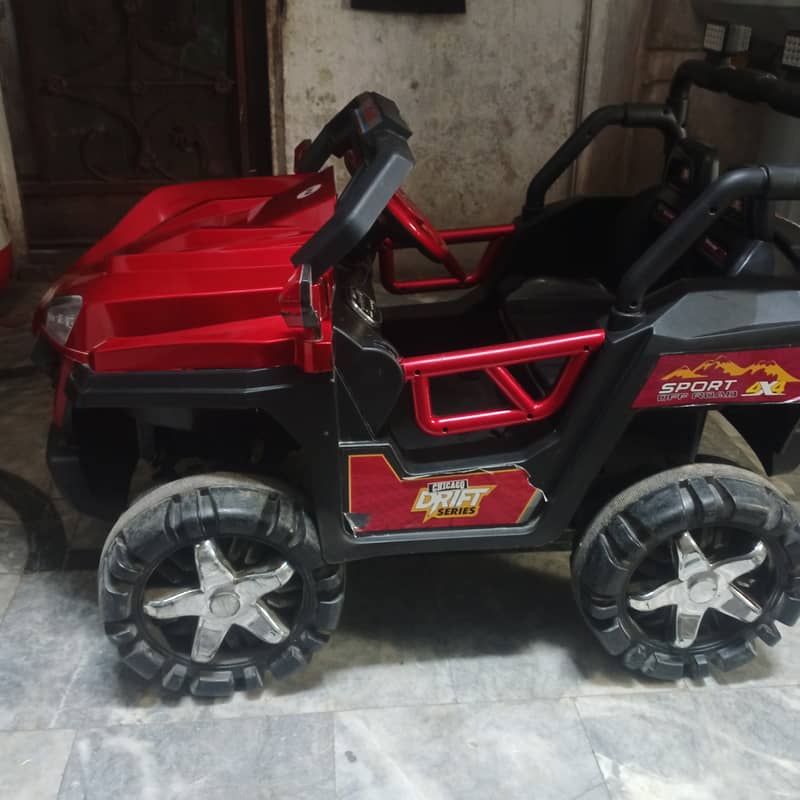 Baby jeep red colour charging wali 10