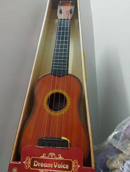 24 inch guitar ukulele 1