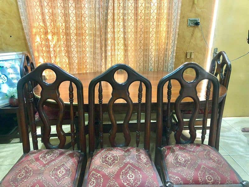 wooden dinning table with five chairs 1