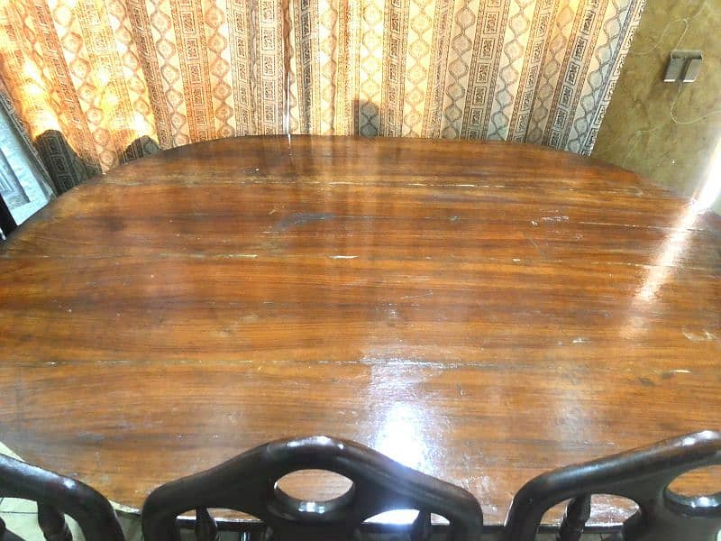 wooden dinning table with five chairs 2