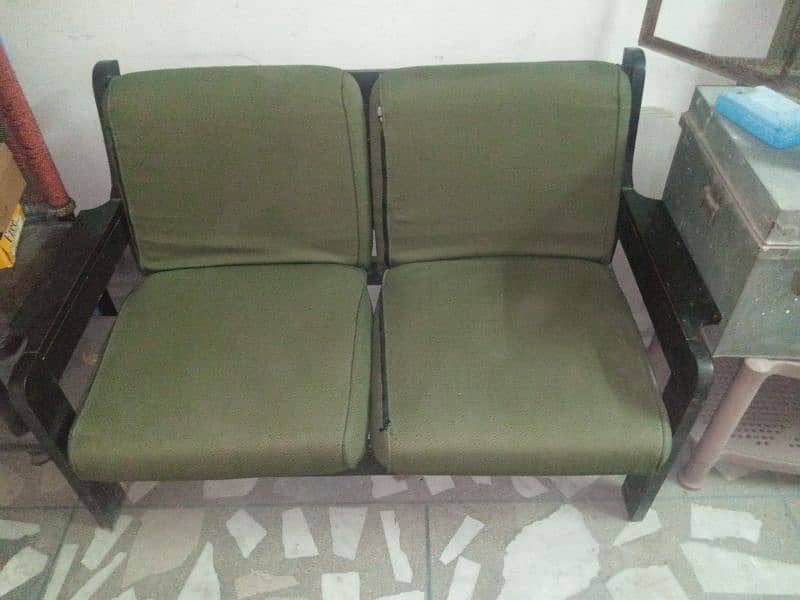 selling wooden sofa 1