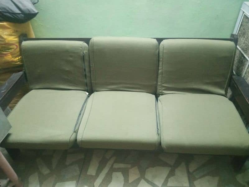 selling wooden sofa 2