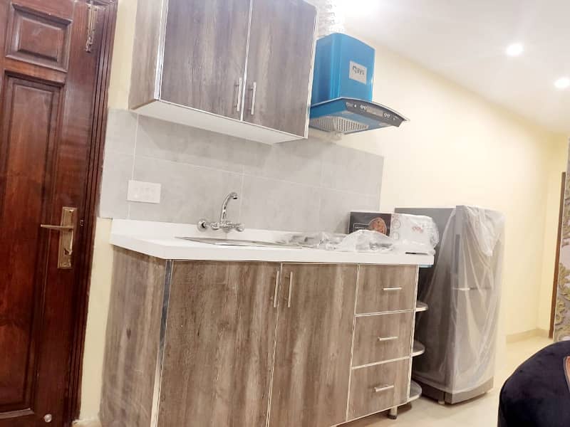 2 bed furnished flat available for Rent in Nishter block bahria town lahore. 11