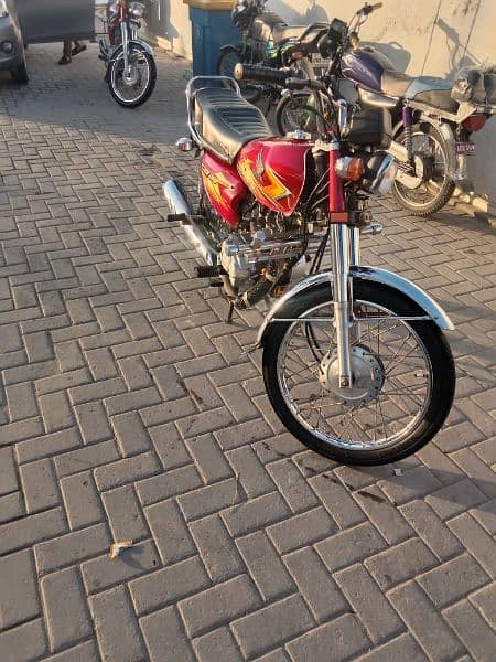 Honda 125 2021 all documents clear Islamabad number lush condition 1