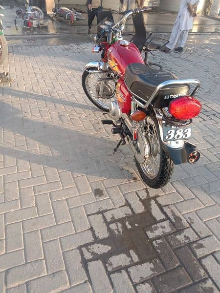 Honda 125 2021 all documents clear Islamabad number lush condition 5