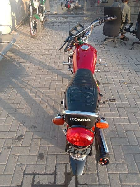 Honda 125 2021 all documents clear Islamabad number lush condition 6