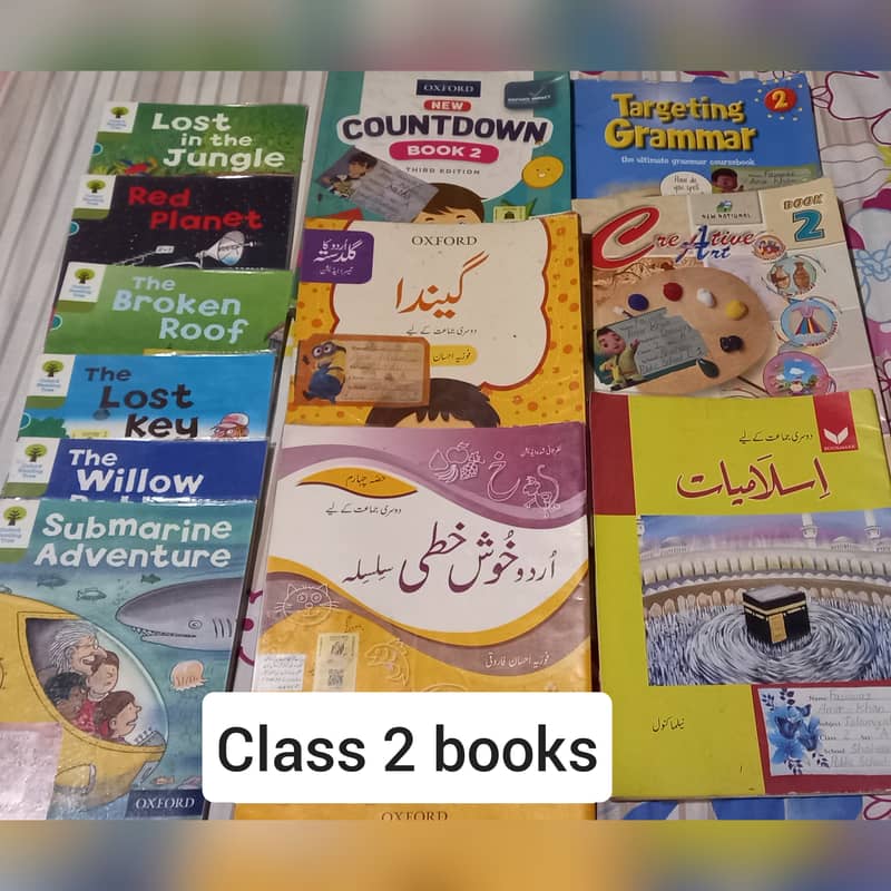 School books of class UKG , 1 , 2 and class 4 1