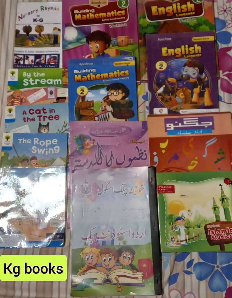 School books of class UKG , 1 , 2 and class 4 2