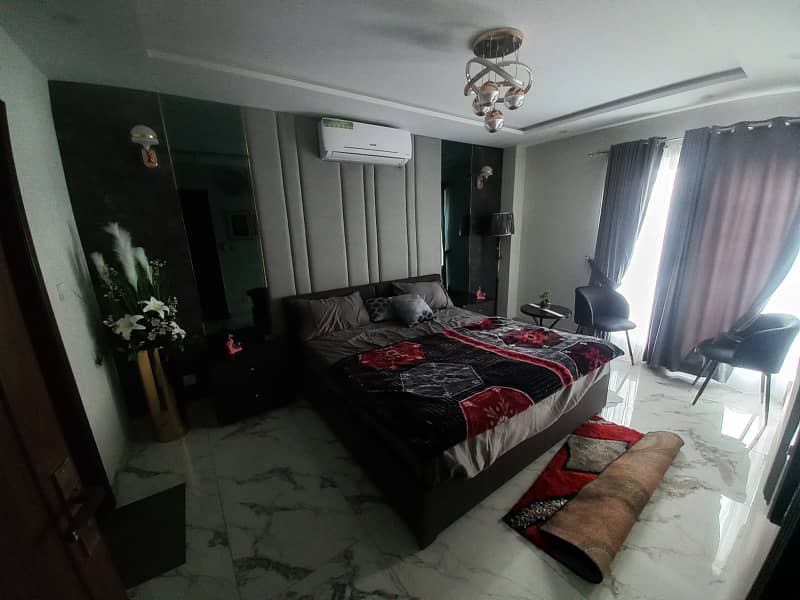 1 bed Semi furnished flat is available for Sale on Main Boulevard near to Eiffle tower bahria town Lahore. 11