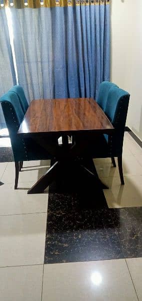 Dinning Table with four sofa chairs and one seat Table 1