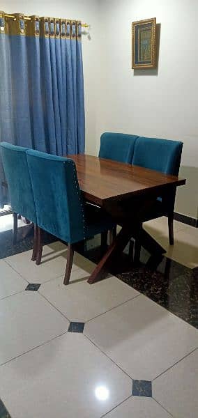 Dinning Table with four sofa chairs and one seat Table 2