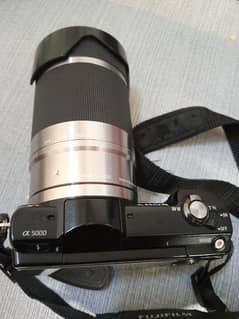 Sony A5000 with 55-210mm silver lens