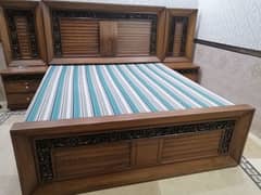 wooden king size dubel bed with side tables