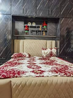King size bed with side tables and matress