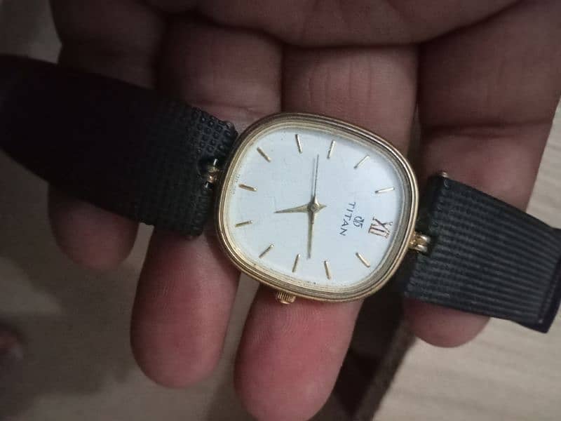 beautiful  Titan date time quartz watch Model whats app 03071138819 1