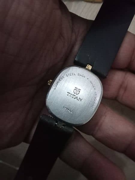 beautiful  Titan date time quartz watch Model whats app 03071138819 3