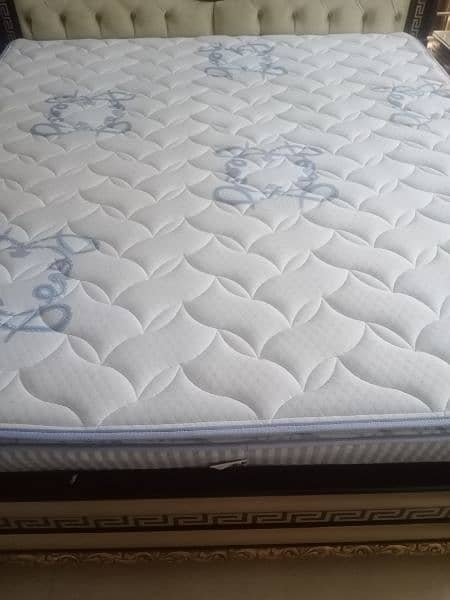 Almost new king size spring mattress 1