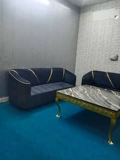 3 seater sofa and table