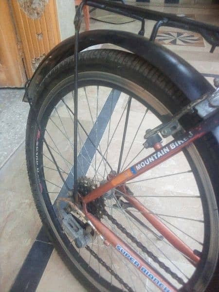 Red and black color new tires and tube break working full size 2