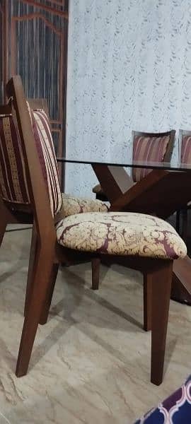wooden chair and glass dining table with wood base 12