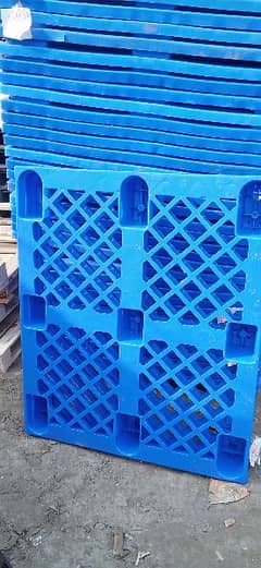 plastic and wooden pallets 0