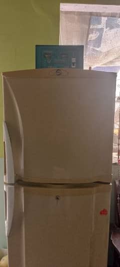 pel medium size fridge with steplizer available in good condition