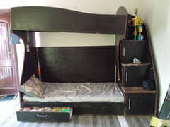 Double bed with one wooden cupboard and 5 huge drawers