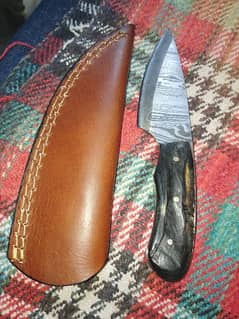 damascus knife whit lather cover