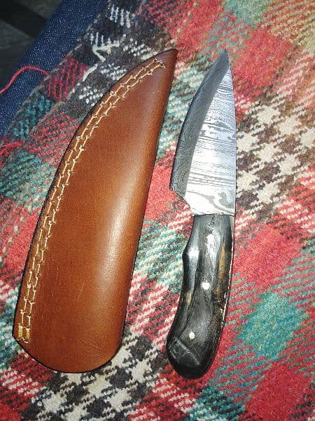 damascus knife whit lather cover 1