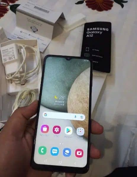 Samsung Galaxy a12 4 128 with box charger and all orginal accessories 1