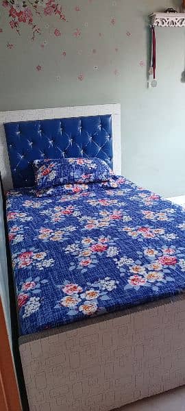 selling a good condition stylish double bed with metres 2