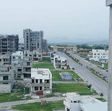 10 Marla Residential Plot Available. For Sale in Faisal Town Block B Islamabad. 11