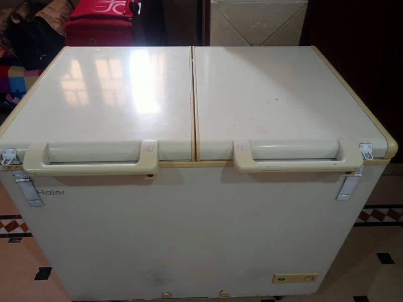 Double door Haier deep freezer with genuine gas and condition. 1