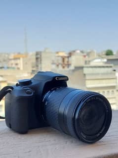 Canon 1200D with EF-S 18-135mm zoom lens