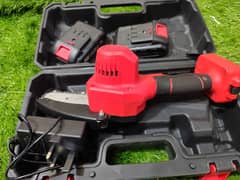 Chainsaw wood cutter portable machine used with 2 batteries